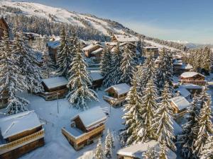 an aerial view of a resort in the snow at Appartement Courchevel 1850, 3 pièces, 6 personnes - FR-1-564-83 in Courchevel