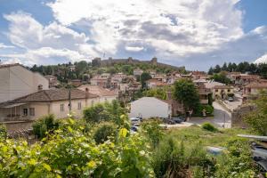 a view of a town with a castle on a hill at City Gate Apartment in Ohrid