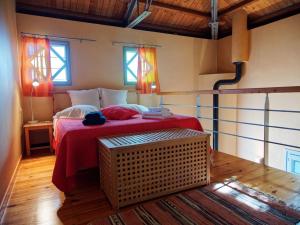 A bed or beds in a room at Tsagkarada Country Estate with Pool