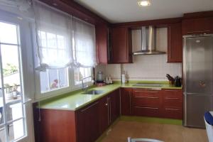 Kuchyň nebo kuchyňský kout v ubytování Preciosa casa en Ribadeo