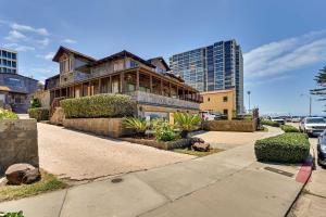 an old house on a street in a city at La Jolla Getaway with Patio and Ocean Views! in San Diego