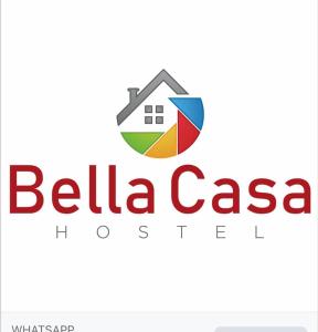 a logo for a real estate company at Bela Casa Hostel in Ji-Paraná