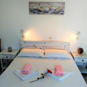 Postel nebo postele na pokoji v ubytování Dolphin Rooms