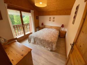 Posteľ alebo postele v izbe v ubytovaní Appartement paisible à Châtel avec Multi Pass dès 3€/jour, proche centre et jardin d'enfants - FR-1-693-12