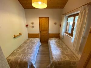 Posteľ alebo postele v izbe v ubytovaní Appartement paisible à Châtel avec Multi Pass dès 3€/jour, proche centre et jardin d'enfants - FR-1-693-12