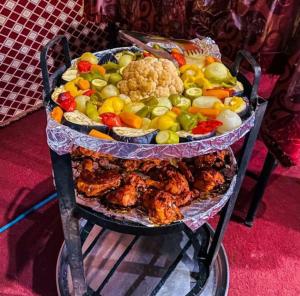 a display of different types of food on a cart at saleem with jeep tour in Wadi Rum