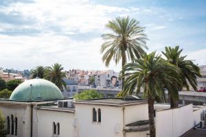 Nespecifikovaný výhled na destinaci Cannes nebo výhled na město při pohledu z apartmánu + 12 fotografií