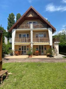 Zahrada ubytování SunSet Beach Apartman