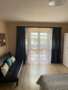 Posezení v ubytování SunSet Beach Apartman