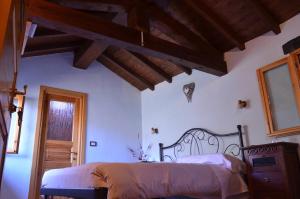 Postel nebo postele na pokoji v ubytování B&B Da Giua'