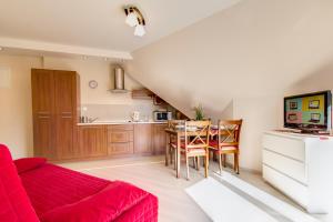Kuchyňa alebo kuchynka v ubytovaní Apartamenty Smrekowa Zakopane