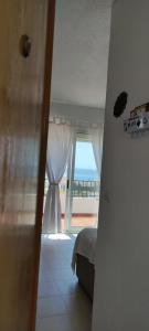Postel nebo postele na pokoji v ubytování TU CASA CERCA DEL MAR + 15 fotografií
