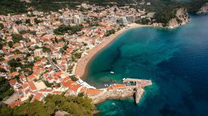 an aerial view of a city and a beach at Apartments Bonazza in Petrovac na Moru