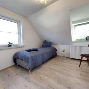 Postel nebo postele na pokoji v ubytování Hotel 24