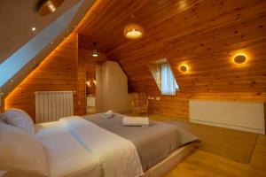 Postel nebo postele na pokoji v ubytování Hotel Restaurant Alpet Theth
