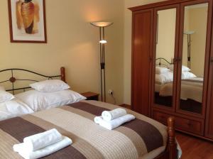 Кровать или кровати в номере Apartment Villa Attila