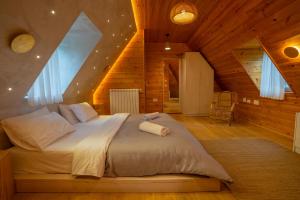 Postel nebo postele na pokoji v ubytování Hotel Restaurant Alpet Theth