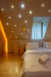 Postel nebo postele na pokoji v ubytování Hotel Restaurant Alpet Theth