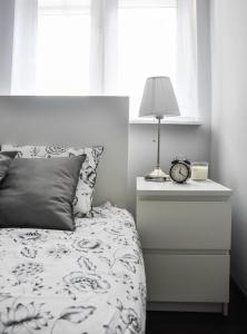 Katil atau katil-katil dalam bilik di Bohaterów Modlina Point by sleepwell