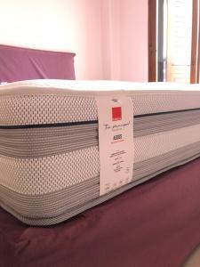 Postel nebo postele na pokoji v ubytování nárciso, elegant living