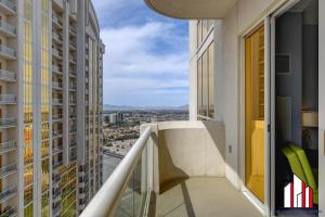 a balcony with a view of a city at MGM Signature-32-621 1Br2Ba F1 Strip View Balcony in Las Vegas