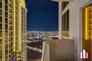 a view of a city at night from a building at MGM Signature-32-621 1Br2Ba F1 Strip View Balcony in Las Vegas