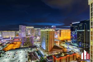 a city lit up at night with at MGM Signature-32-621 1Br2Ba F1 Strip View Balcony in Las Vegas