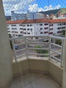 a balcony with a view of a city at Rio Quente Thermas Paradise in Rio Quente