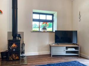 A television and/or entertainment centre at Tranquillity-uk38552