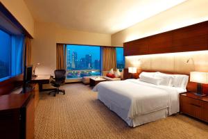 Postel nebo postele na pokoji v ubytování The Westin Guangzhou