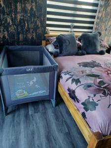 מיטה או מיטות בחדר ב-Beautiful MASONS HIDEAWAY studio apartment
