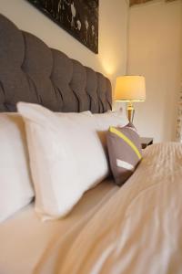 Een bed of bedden in een kamer bij El Encino Cabin in Real del Monte
