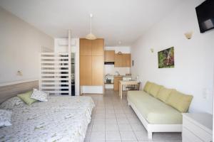 Kuchyň nebo kuchyňský kout v ubytování Ilian Beach & Apartments