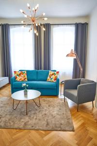 Et opholdsområde på Fancy Home For 5 With Self-Check-In At Spittelberg