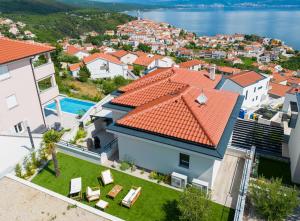 arial view of a house with a roof at Villa See Vrbnik in Vrbnik