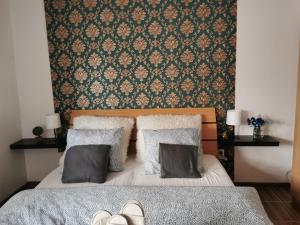 Postel nebo postele na pokoji v ubytování AG Apartment Gabčíkovo