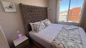 Postel nebo postele na pokoji v ubytování Haut Standing Appartement - Centre Ville Oujda