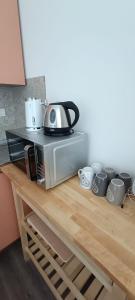 Příslušenství pro přípravu čaje a kávy v ubytování AR SAN SALVO B&B