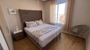 Postel nebo postele na pokoji v ubytování Haut Standing Appartement - Centre Ville Oujda