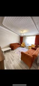 En eller flere senge i et værelse på Geyikli Ada Apart Otel