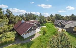 an overhead view of a house with a red roof at 4 Bedroom Gorgeous Home In Thisted in Nørre Vorupør
