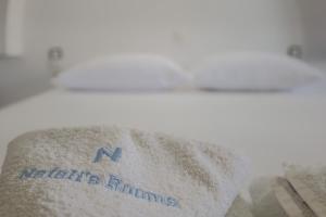 Postel nebo postele na pokoji v ubytování Nefelis Rooms