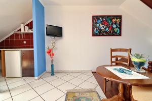 TV a/nebo společenská místnost v ubytování Fancy Apartments Marco
