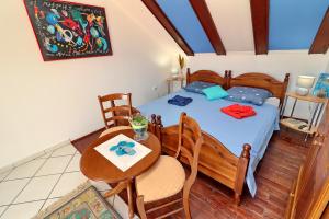 Postel nebo postele na pokoji v ubytování Fancy Apartments Marco