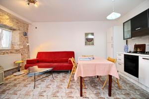 Kuchyň nebo kuchyňský kout v ubytování Fancy Apartments Marco