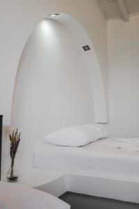 Postel nebo postele na pokoji v ubytování Nefelis Rooms