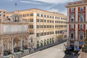 a view of a city street with buildings at The St. Regis Rome in Rome