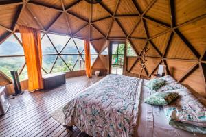 Cama o camas de una habitación en Tambo Eco Hotel