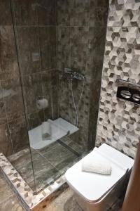 Koupelna v ubytování Dioscuri Deluxe Apartments