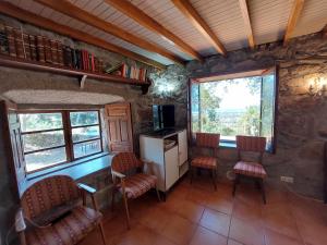 Posedenie v ubytovaní A Casiña Casitas con jardin de ensueño